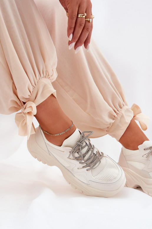 Sneakers tüüpi jalanõud Pealiste omad platvormiga Ozdobnym Paeladm beeži värvi Evalianne Sneakers tüüpi jalanõud Pealiste omad platvormiga Ozdobnym Paeladm beeži värvi Evalianne