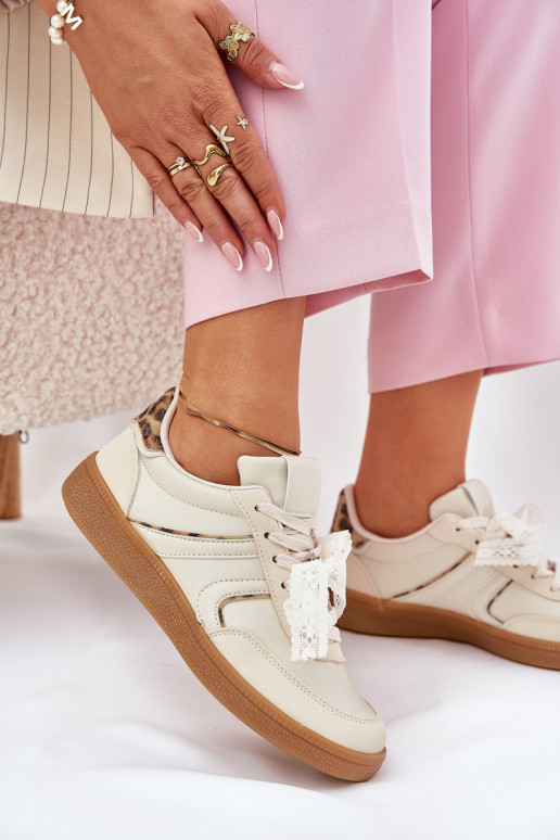 madalad tennised mudeliga naiste kingad paeltega leopardimustriga liivakarva Zielle