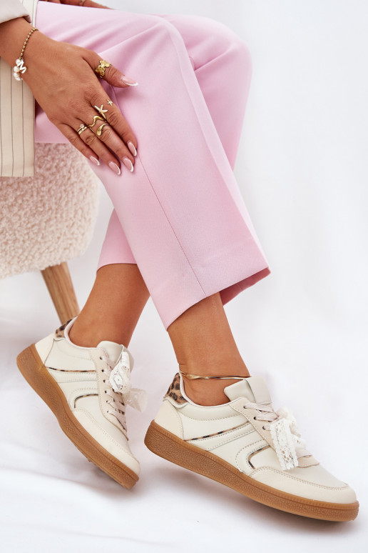 madalad tennised mudeliga naiste kingad paeltega leopardimustriga liivakarva Zielle