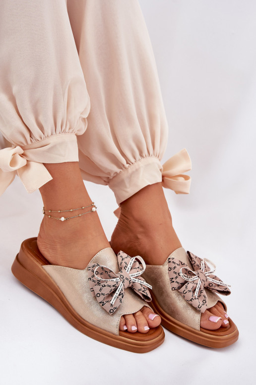 naiste plätud Kiilu peal lipsukesega Kuldset värvi Moonzella