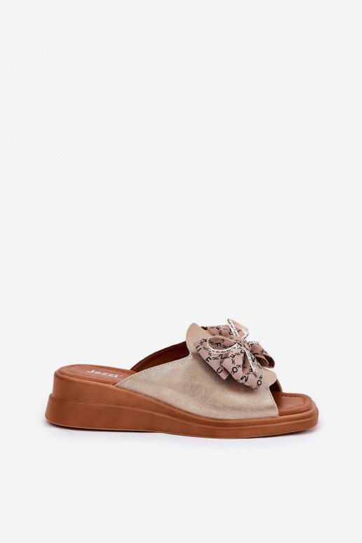 naiste plätud Kiilu peal lipsukesega Kuldset värvi Moonzella