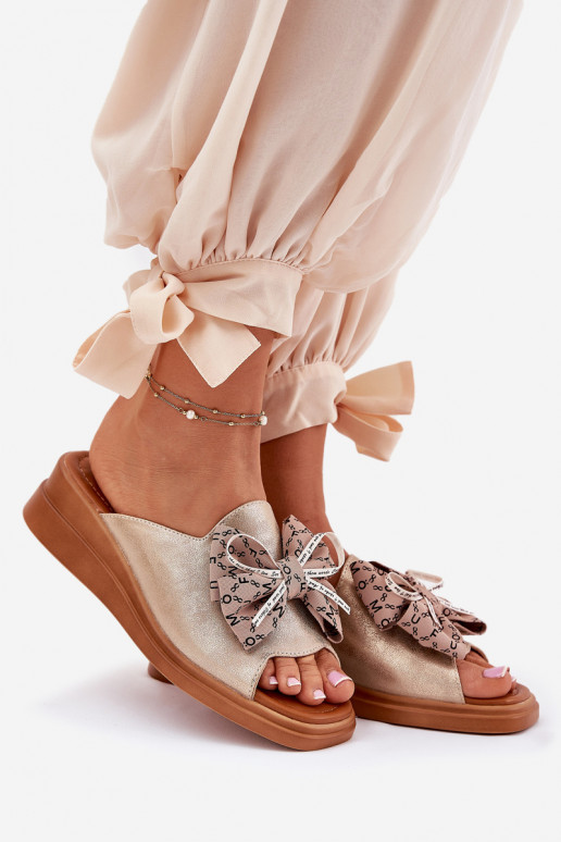 naiste plätud Kiilu peal lipsukesega Kuldset värvi Moonzella