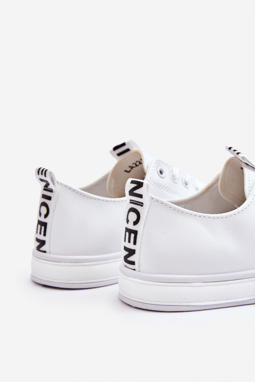 Klassikalised spordijalatsid valget värvi Ville