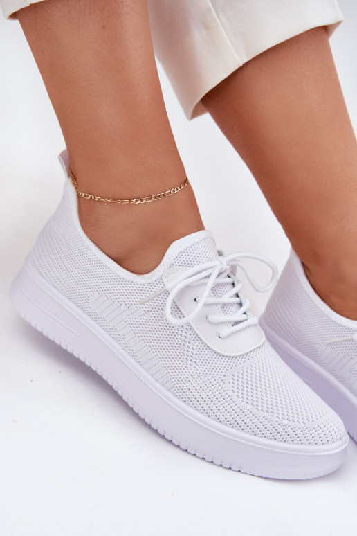 Riidest Slip-on spordijalatsid platvormiga Pealiste omad valget värvi Kalyra Riidest Slip-on spordijalatsid platvormiga Pealiste omad valget värvi Kalyra