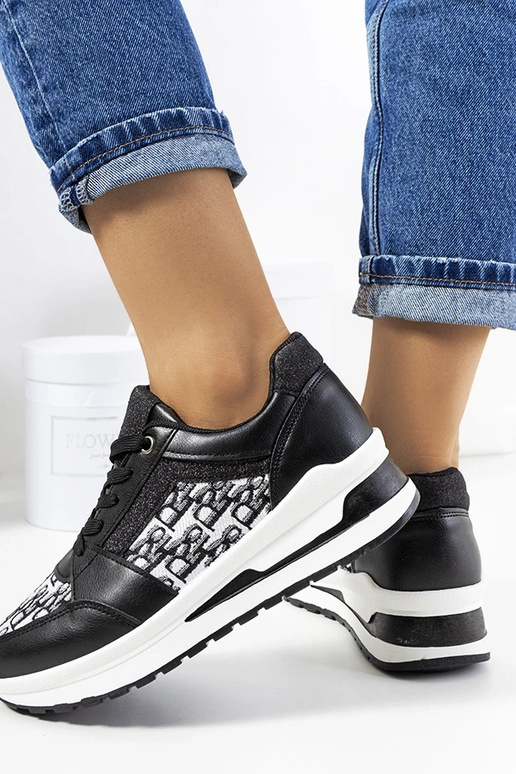 Mustad spordijalatsid paksu talla ja... Mustad spordijalatsid paksu talla ja...