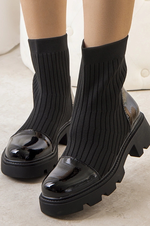 Mustad elastse varrega poolsaapad Edelmi