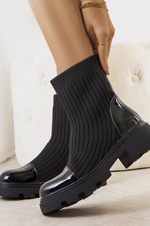 Mustad elastse varrega poolsaapad Edelmi