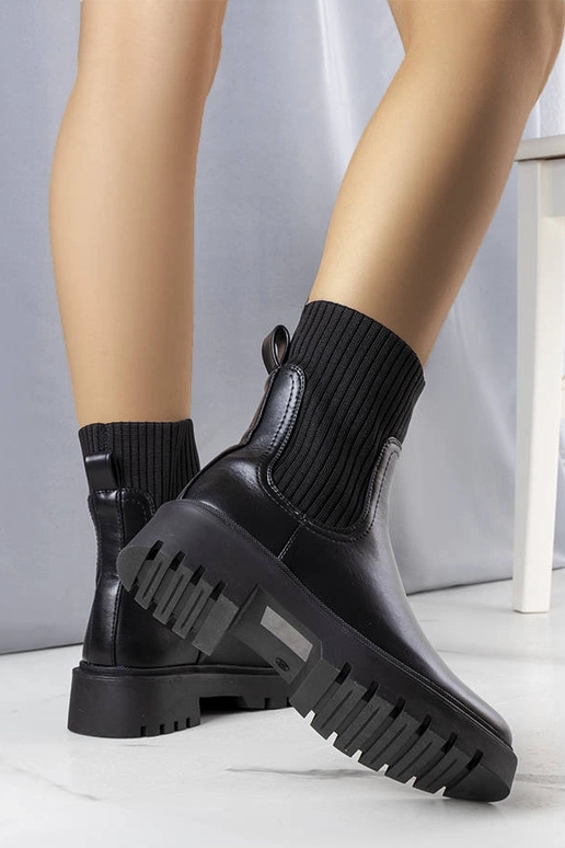 Mustad isoleeritud poolsaapad Caland