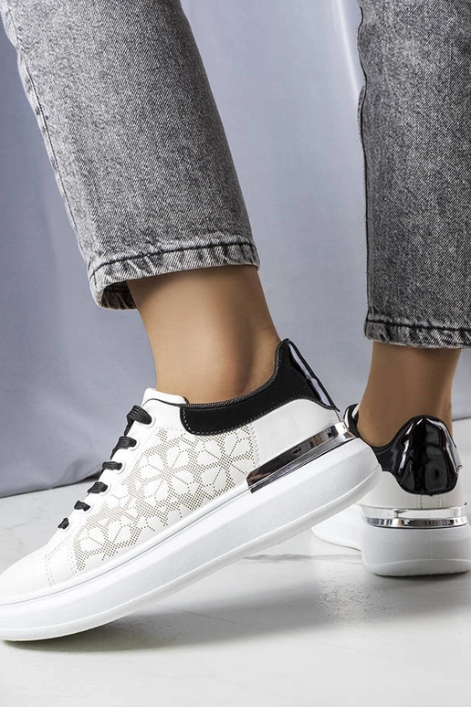 Erin mustad ja valged perforeeritud...