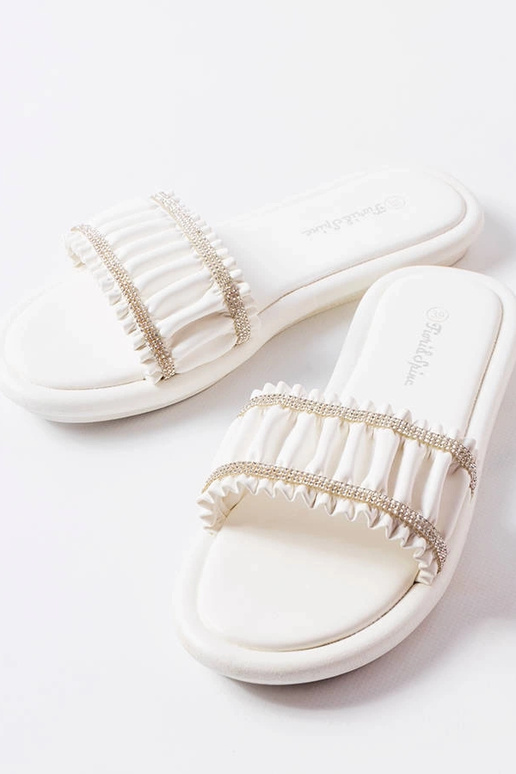 Valged volangidega muulad Anapori...