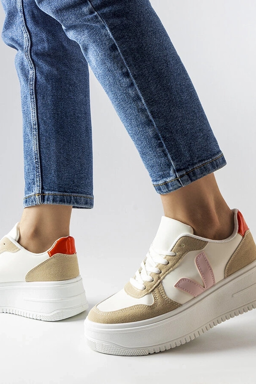 Valged spordijalatsid roosa...