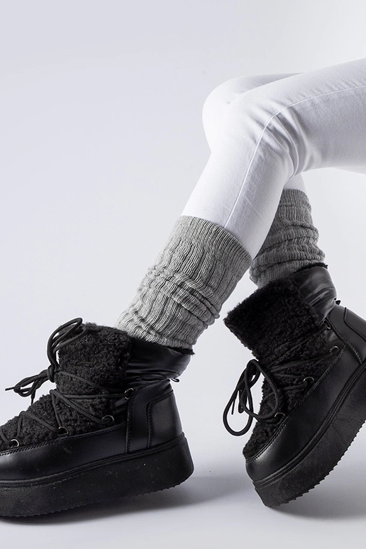 Mustad lumesaapad massiivsel Elvio...