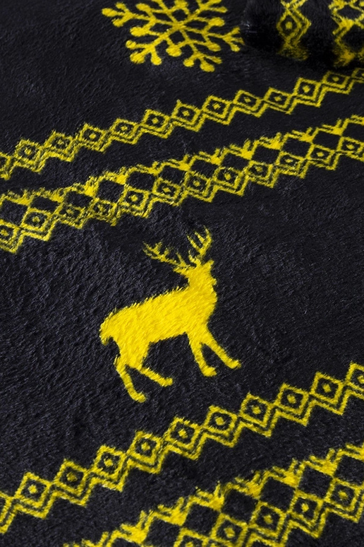 Velma must kollaste jõulumustritega tekk