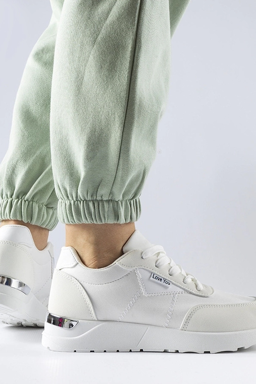 Geraldino valgest kangast tossud Geraldino valgest kangast tossud