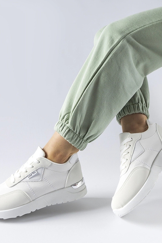 Geraldino valgest kangast tossud Geraldino valgest kangast tossud