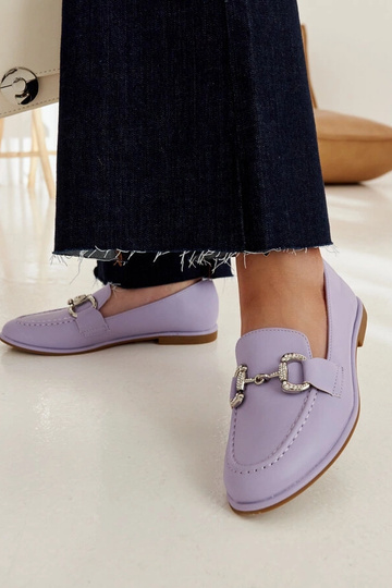 Marija lillad mokassiinid...