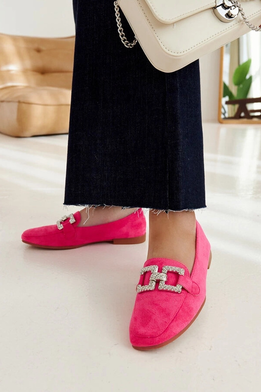 Kuensi ketiga kaunistatud roosad...