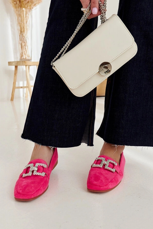 Kuensi ketiga kaunistatud roosad...