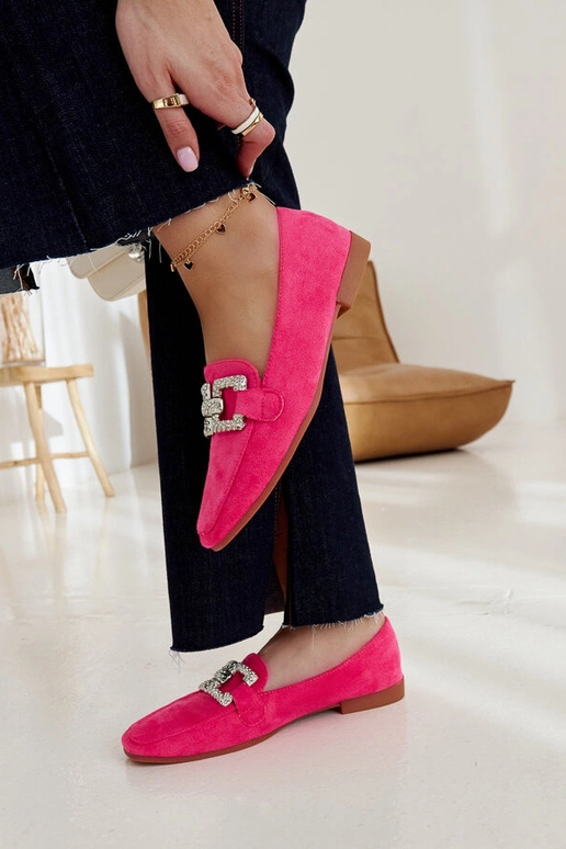 Kuensi ketiga kaunistatud roosad...