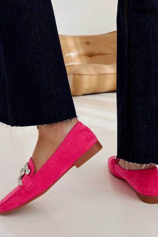 Kuensi ketiga kaunistatud roosad...