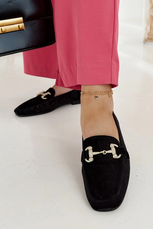 Mustad sametist mokassiinid...