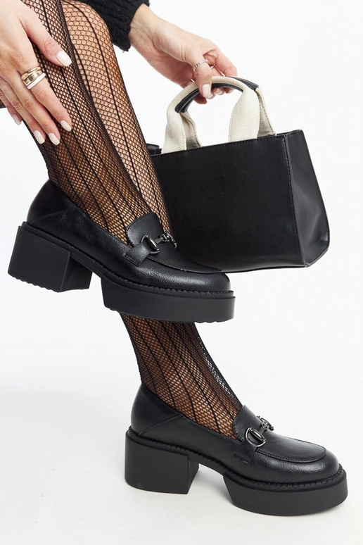 Mustad ökonahast kõrge kontsaga...