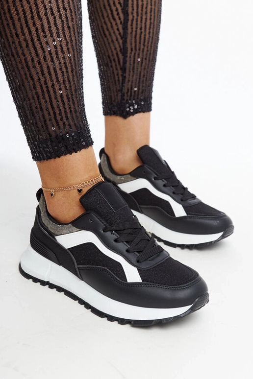 Evelia mustad sädelevad platvormtossud