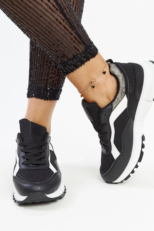 Evelia mustad sädelevad platvormtossud