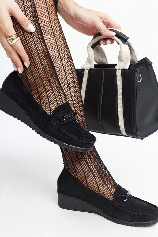 Ameli mustad kiilpüksid