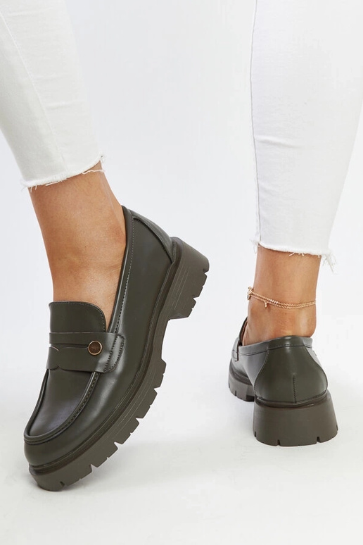 Tumedad rohelised kingad kunstnahast...