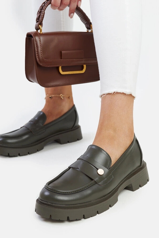 Tumedad rohelised kingad kunstnahast...