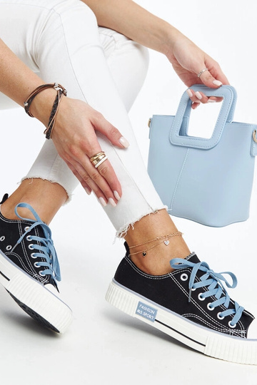 Mustad värviliste paeltega...