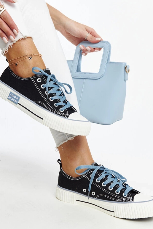 Mustad värviliste paeltega tossud...