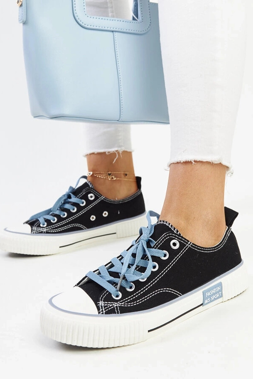 Mustad värviliste paeltega tossud...