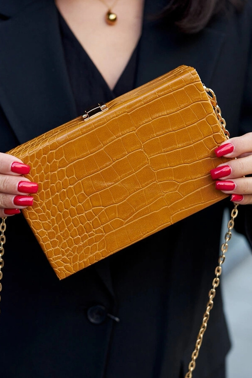 Kollane ,,pagasiruumi'' kott ketil...