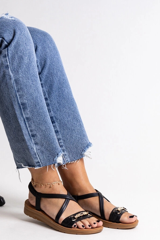 Mustad sandaalid kuldse pandlaga...