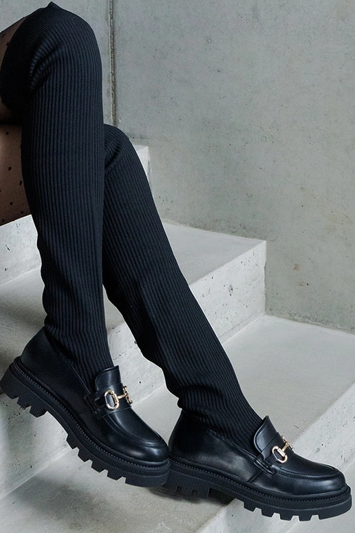 Mustad saapad elastse varruga lamedal...