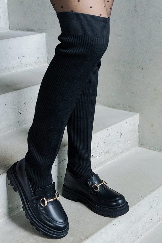 Mustad saapad elastse varruga lamedal...