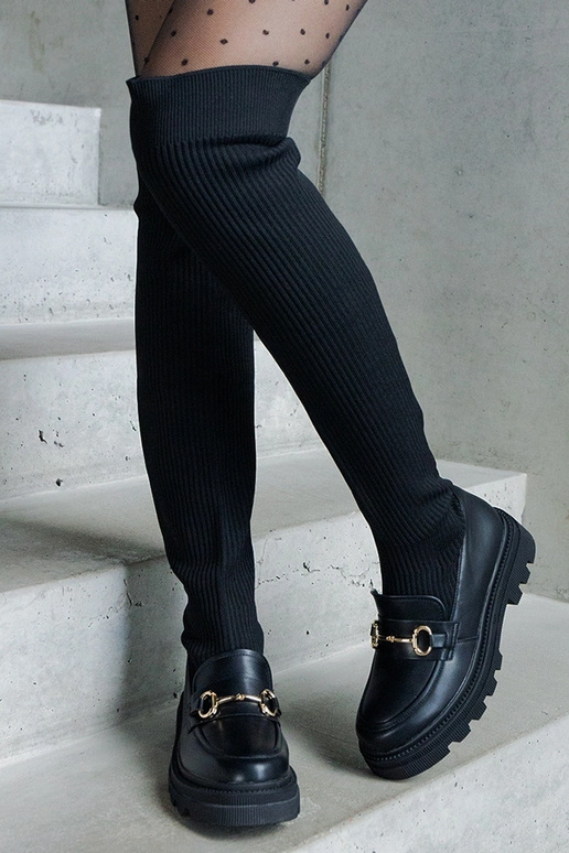 Mustad saapad elastse varruga lamedal...