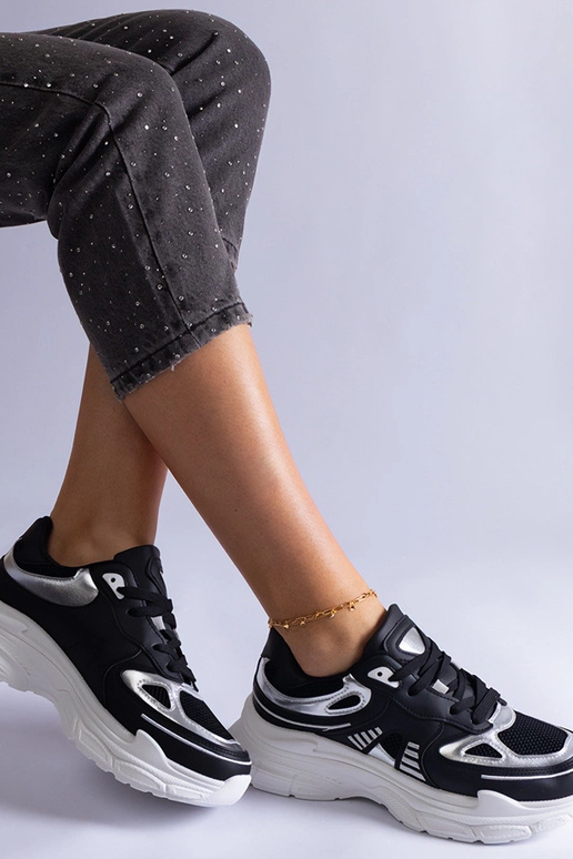 Mustad naiste tossud hõbedaste...