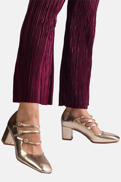 Kuldsed pumbad, millel on plokkkonts...