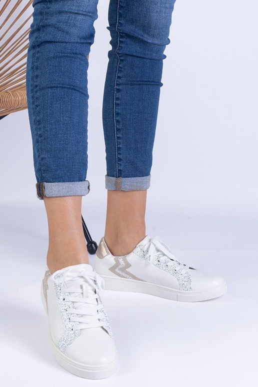 Valged naiste tossud reljeefse ja...