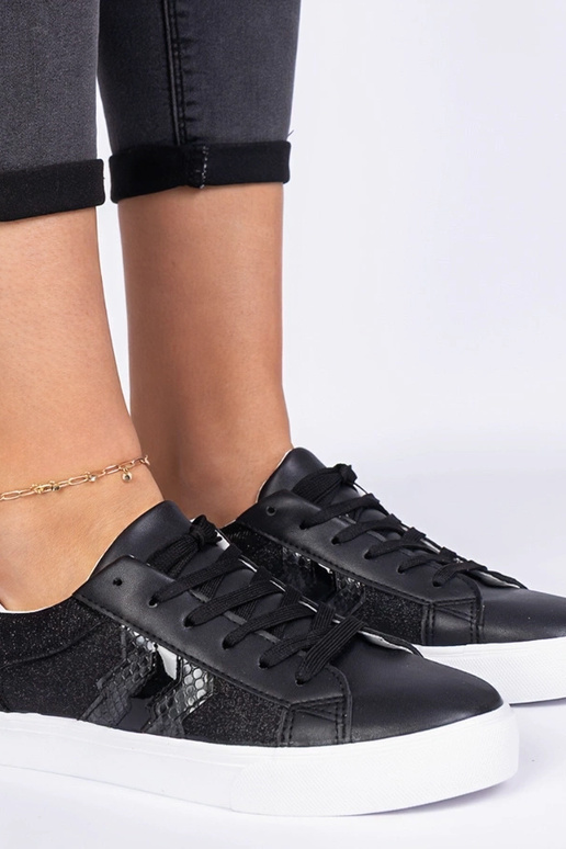 Mustad sneakerid loomamustriga,...