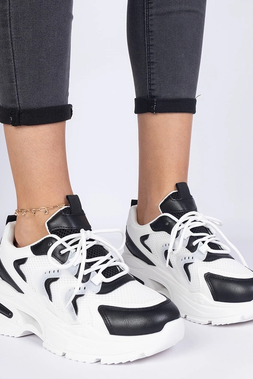 Valge-mustad naiste sporditennised...