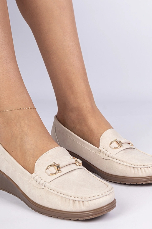 Kreemjas naiste mokasiin platvormil...