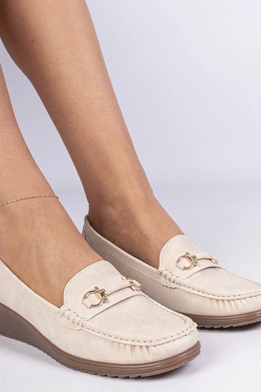 Kreemjas naiste mokasiin platvormil...