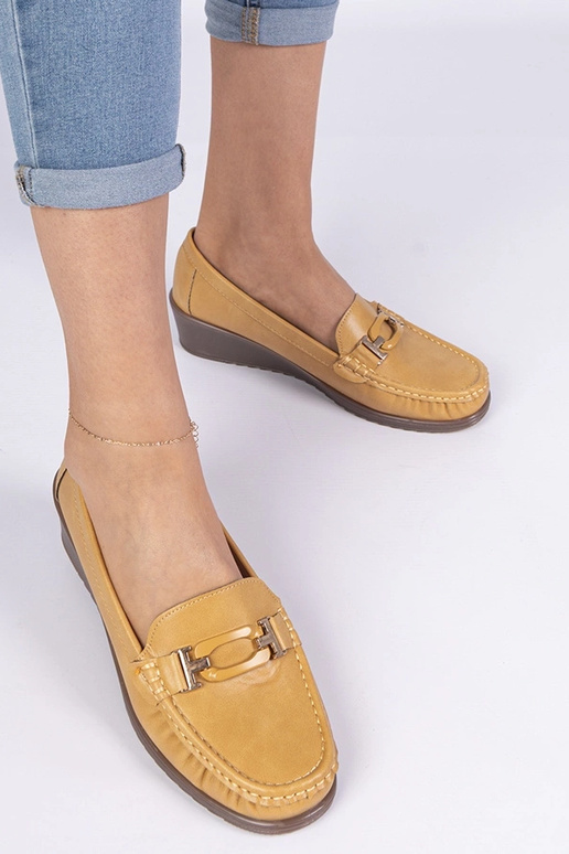 Kollane naiste mokasiin platvormil...