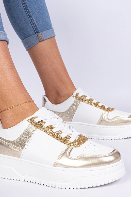 Kuldsete naiste snekerid paksul... Kuldsete naiste snekerid paksul...