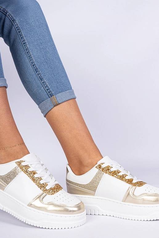 Kuldsete naiste snekerid paksul... Kuldsete naiste snekerid paksul...