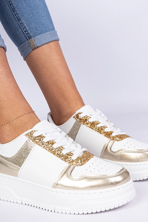 Kuldsete naiste snekerid paksul... Kuldsete naiste snekerid paksul...